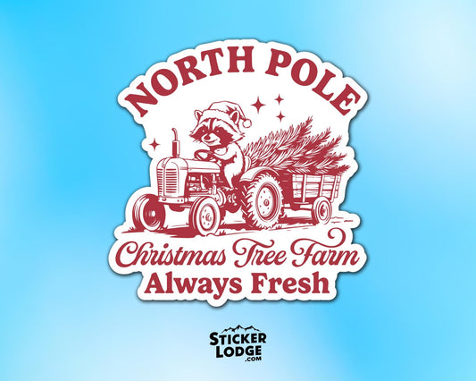 North Pole Christmas Tree Farm Raccoon Vinyl Sticker | Sticker Lodge
