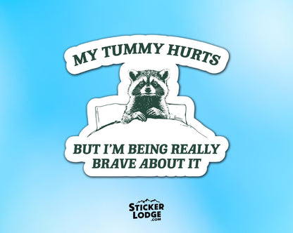 My Tummy Hurts Raccoon Vinyl Sticker | Sticker Lodge